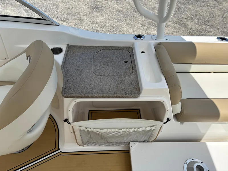 Slide: The Image of 2019 Key West 239 DFS boat interior with seating and storage area. - 9