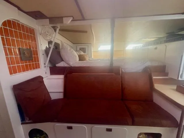 Slide: The Image of Interior of 1980 Custom Horstman Tristar Ketch with cozy seating and bed area. - 15