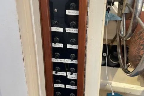 Slide: The Image of Control panel on 1980 Custom Horstman Tristar Ketch, featuring labeled switches for various functions. - 17