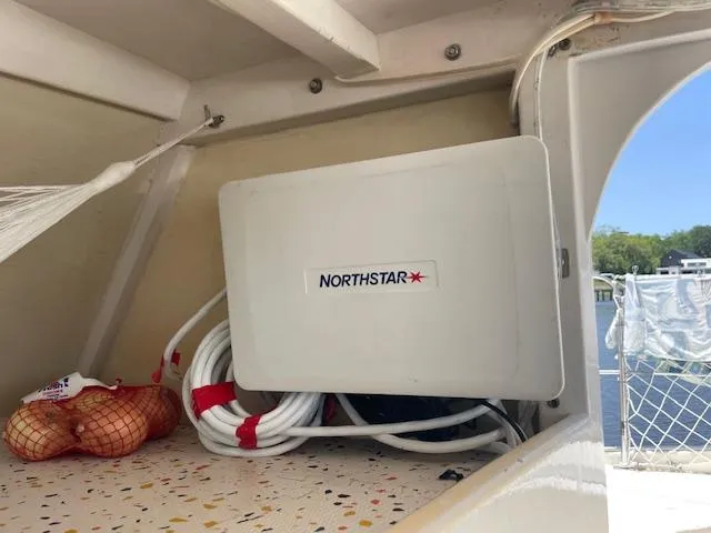 Slide: The Image of Storage area on a 1980 Custom Horstman Tristar Ketch with Northstar equipment and netted onions. - 6