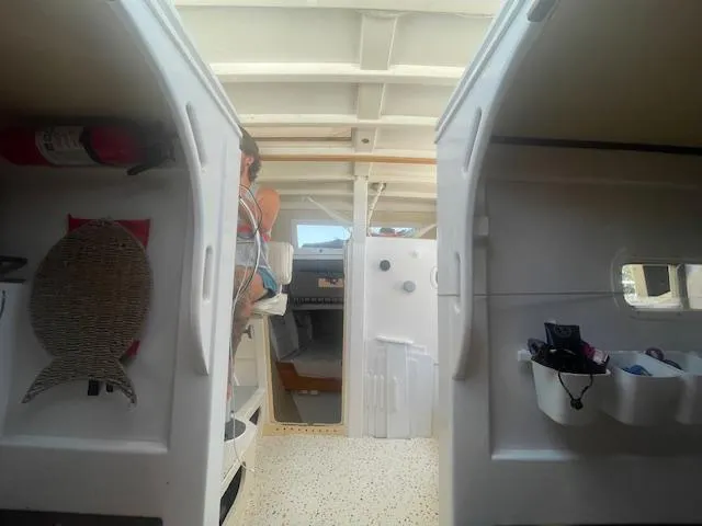 Slide: The Image of Interior view of 1980 Custom Horstman Tristar Ketch sailboat, featuring storage and seating areas. - 7