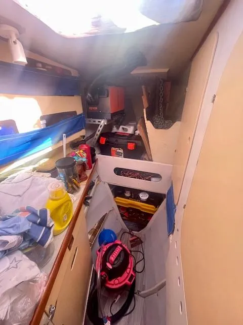 Slide: The Image of Interior of 1980 Custom Horstman Tristar Ketch sailboat, showing storage and equipment. - 9