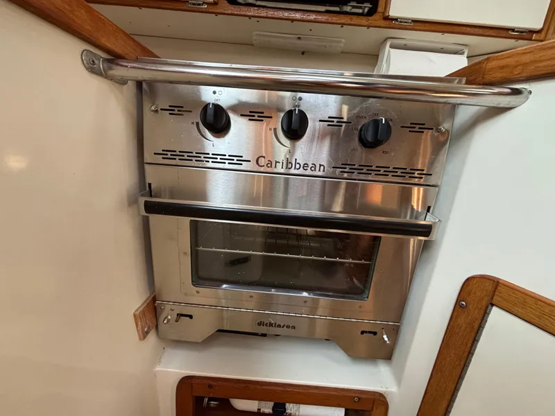 Slide: The Image of Stainless steel oven in a 1998 Catalina 320 yacht kitchen. - 21