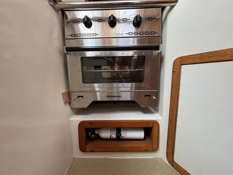 Slide: The Image of Stainless steel oven in a 1998 Catalina 320 sailboat galley. - 22