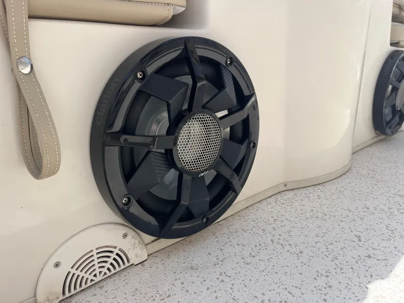 Slide: The Image of Speaker system on a 2019 Carolina Skiff 238 DLV boat interior. - 13