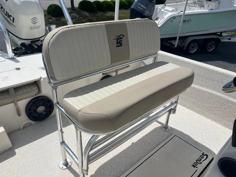 Slide: The Image of 2019 Carolina Skiff 238 DLV boat seat with beige and white upholstery. - 16