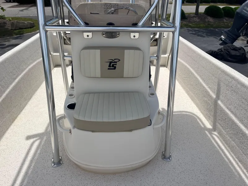 Slide: The Image of 2019 Carolina Skiff 238 DLV boat interior with seating and console. - 9