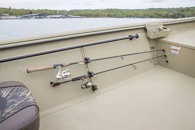 Slide: The Image of 2025 Crestliner 1860 Retriever CC Tunnel boat with camo design and steering console. - 17