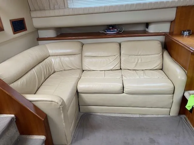 Slide: The Image of Luxurious beige leather sofa in 2003 Cruisers Yachts 3750 Motoryacht interior. - 28