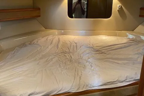 Slide: The Image of Interior cabin of 2003 Cruisers Yachts 3750 Motoryacht with cozy bed and soft lighting. - 47