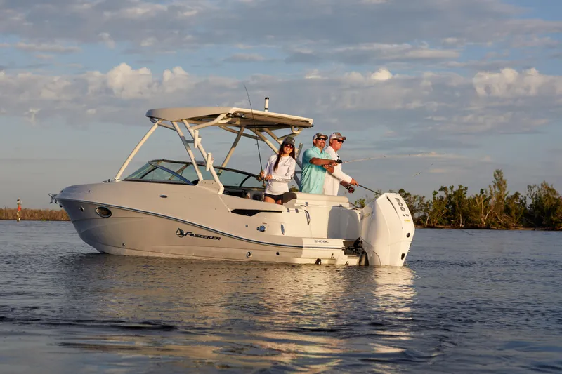 Slide: The Image of 2026 Finseeker 240 DC boat on calm water with people fishing. - 5