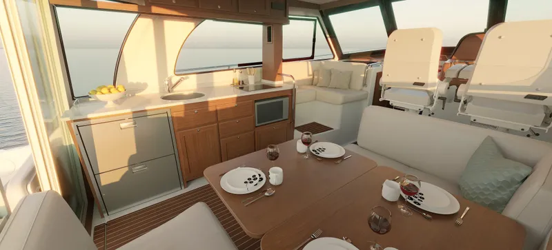 Slide: The Image of Luxurious interior of 2026 Back Cove 412 yacht with dining area and kitchenette. - 13