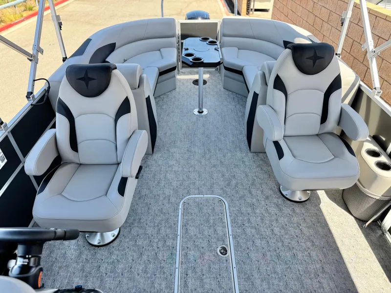 Slide: The Image of 2025 Berkshire 22RFX LE boat interior with plush seating and modern design. - 12