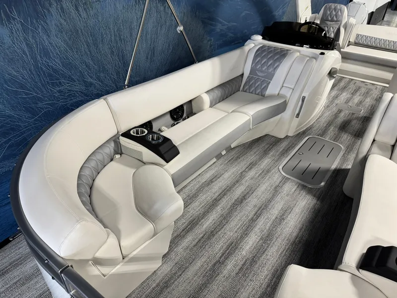 Slide: The Image of Luxurious interior of 2026 Bennington 27 RXSBAT2 pontoon boat with plush seating. - 8