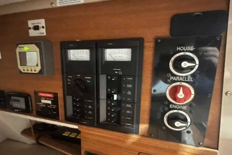 Slide: The Image of Control panel of a 2019 Ranger R27 LE boat with switches and gauges. - 15
