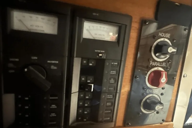 Slide: The Image of Control panel of a 2019 Ranger R27 LE boat with switches and gauges. - 17