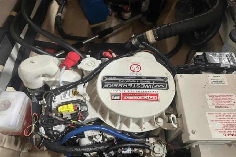 Slide: The Image of Engine compartment of a 2019 Ranger R27 LE with Westerbeke generator. - 2