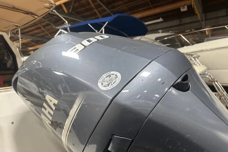 Slide: The Image of Yamaha 300 outboard motor on a 2019 Ranger R27 LE boat in a marina. - 35