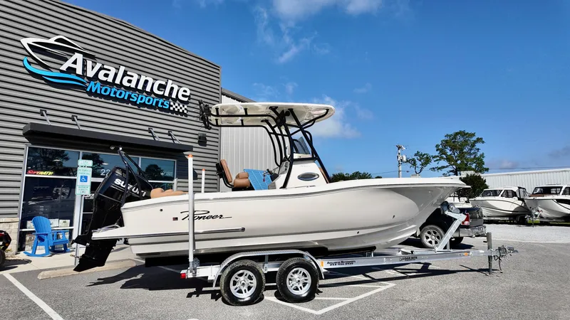 The Image of 2025 Pioneer 222 Islander boat on trailer at Avalanche Motorsports dealership. - 0