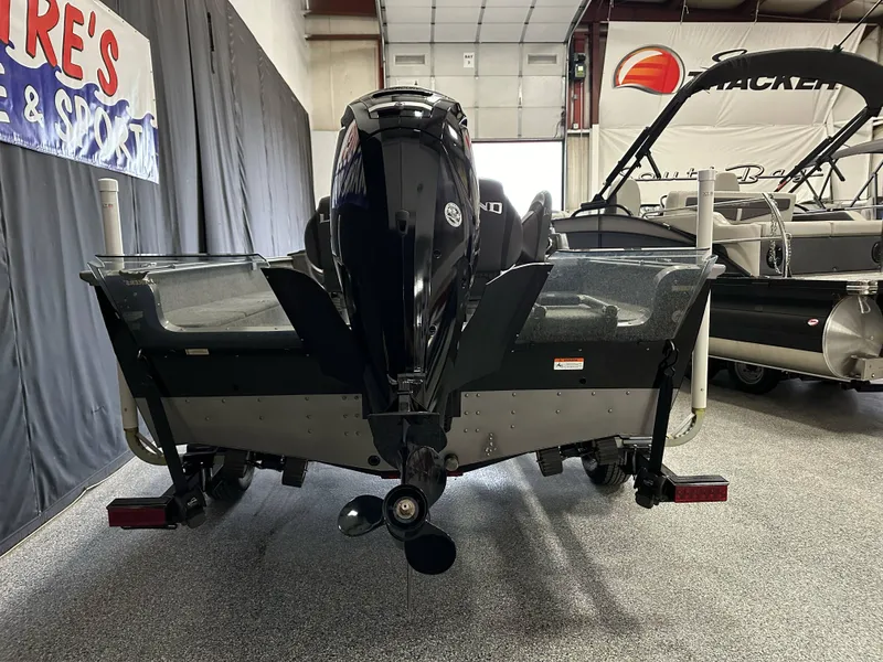 Slide: The Image of 2017 Lund 1675 Impact SS boat, rear view in showroom. - 3
