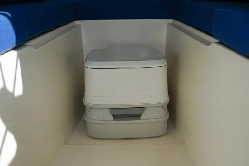 Slide: The Image of Portable toilet inside 2016 C-Dory 22' Cruiser boat cabin. - 16