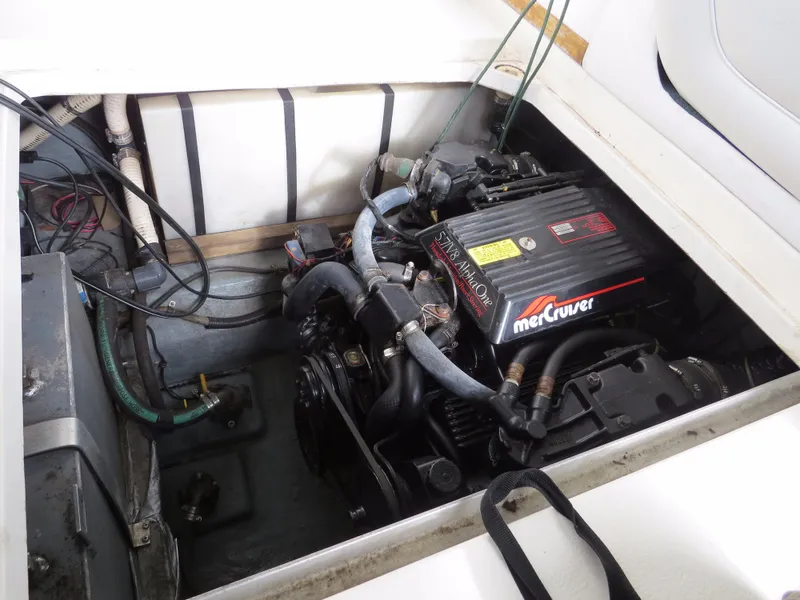 Slide: The Image of Engine compartment of a 1989 Sea Ray Sundancer 280 with MerCruiser engine. - 23