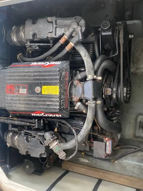 Slide: The Image of 1989 Sea Ray Sundancer 280 engine compartment with MerCruiser 5.7L V8 engine. - 30