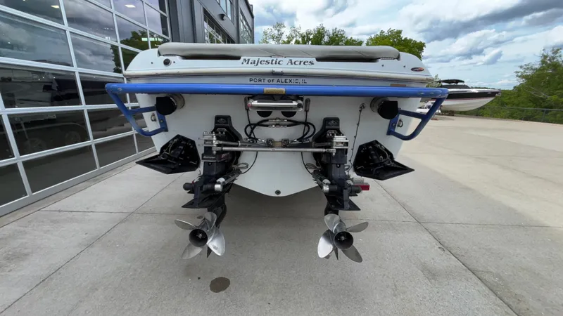 Slide: The Image of Rear view of 2003 Baja 33 Outlaw boat with dual propellers. - 40
