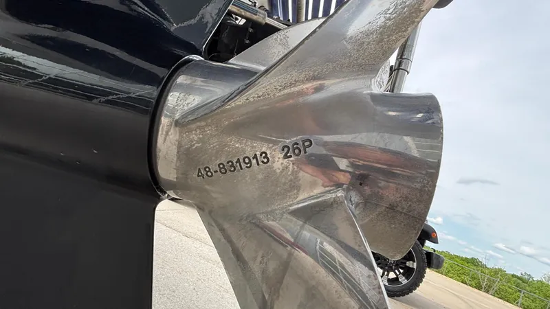 Slide: The Image of Close-up of a 2003 Baja 33 Outlaw boat propeller with engraved numbers. - 42