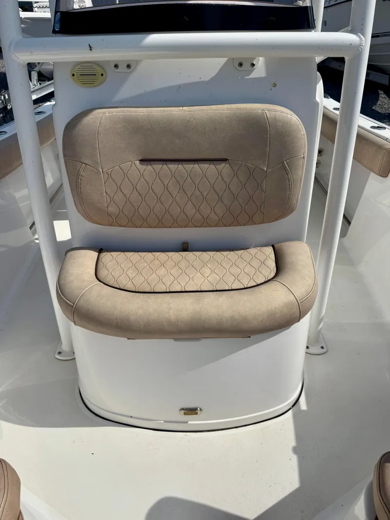 Slide: The Image of 2020 Sportsman Open 212 Center Console boat seat with beige upholstery. - 8