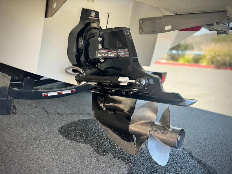 Slide: The Image of 2006 Cobalt 232 boat with MerCruiser outdrive and stainless steel propeller. - 12