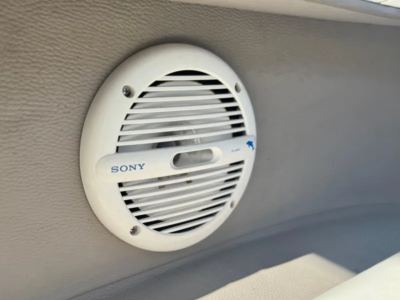 Slide: The Image of Sony speaker installed in a 2006 Cobalt 232 boat interior. - 28