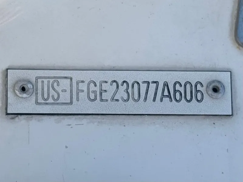 Slide: The Image of Hull identification number on a 2006 Cobalt 232 boat. - 32
