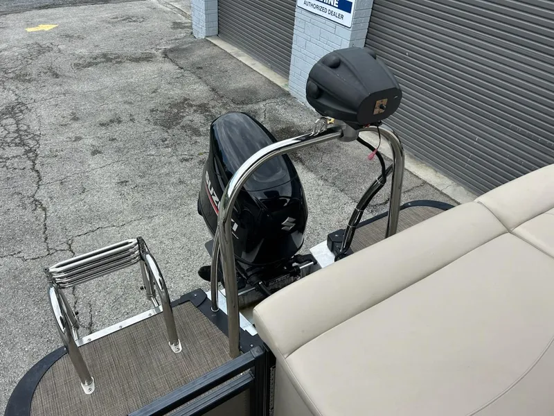 Slide: The Image of 2018 Avalon 2485 LSZ Cruise boat with Suzuki outboard motor and ladder. - 11