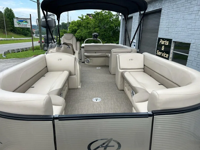 Slide: The Image of 2018 Avalon 2485 LSZ Cruise pontoon boat with beige seating and canopy. - 5
