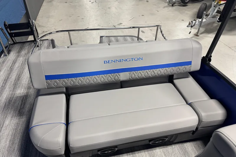 Slide: The Image of 2026 Bennington 24 MSB boat interior with gray and blue seating. - 14