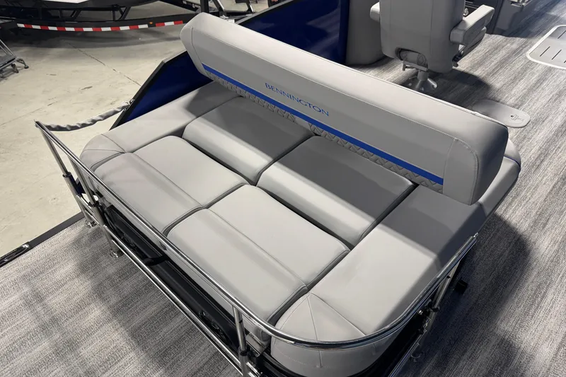 Slide: The Image of 2026 Bennington 24 MSB boat with luxurious gray seating and modern design. - 15