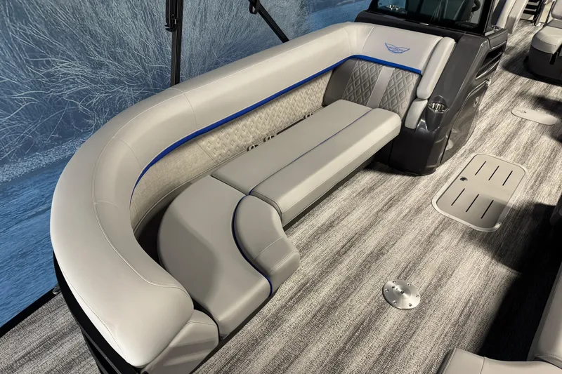 Slide: The Image of 2026 Bennington 24 MSB boat interior with luxurious gray seating and modern design. - 5