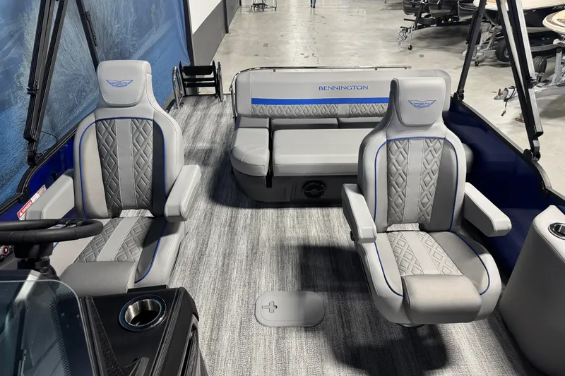 Slide: The Image of 2026 Bennington 24 MSB boat interior with luxurious seating and modern design. - 7