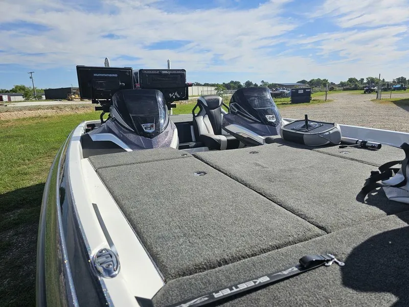 Slide: The Image of 2020 Skeeter FXR21 boat with dual seats and advanced navigation systems. - 11