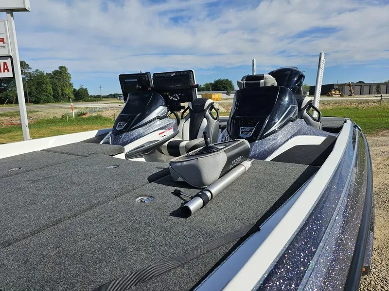 Slide: The Image of 2020 Skeeter FXR21 boat with dual consoles and fishing gear on deck. - 13