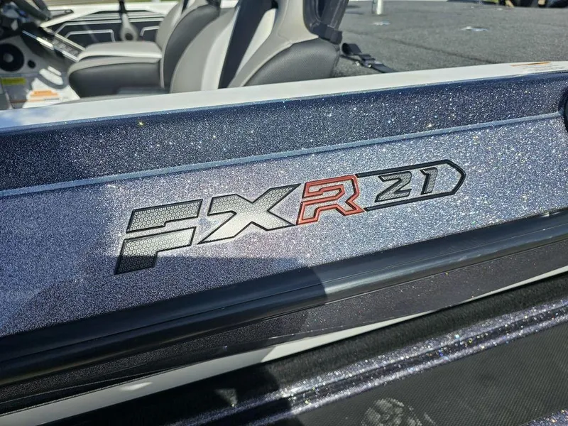 Slide: The Image of 2020 Skeeter FXR21 boat with metallic finish and logo detail. - 15