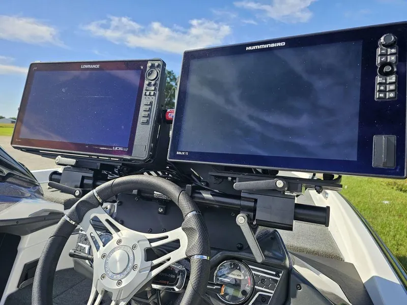 Slide: The Image of 2020 Skeeter FXR21 boat dashboard with Lowrance and Humminbird displays. - 7