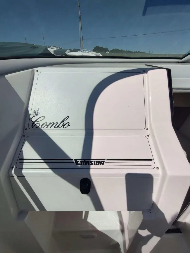 Slide: The Image of 1998 Envision 2900 Combo boat dashboard with logo and shadow. - 36