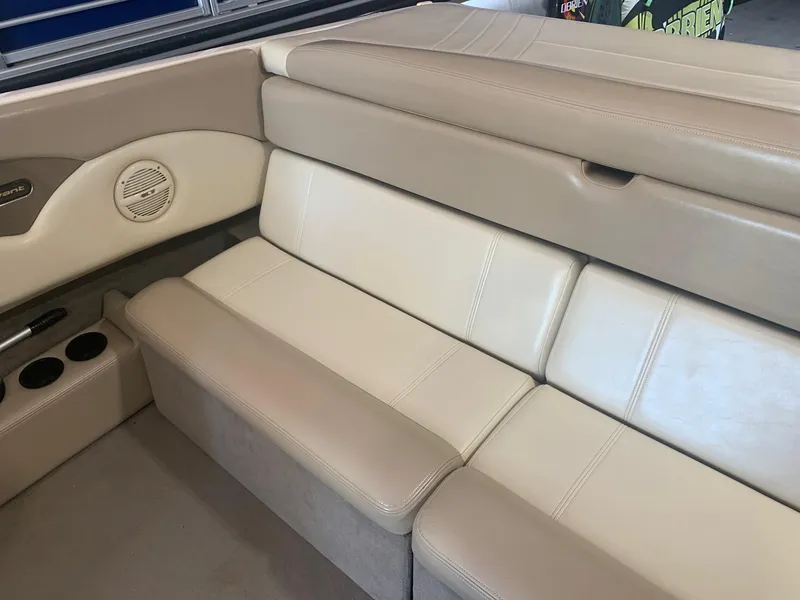 Slide: The Image of Beige leather seating in a 2003 Bryant 232 RB boat interior. - 10