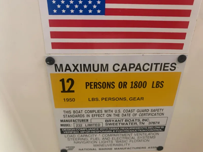 Slide: The Image of 2003 Bryant 232 RB capacity plate: 12 persons or 1800 lbs, U.S. Coast Guard compliant. - 14