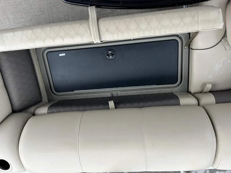 Slide: The Image of 2024 Sun Tracker Sport Fish 20 DLX boat seating with storage compartment. - 11