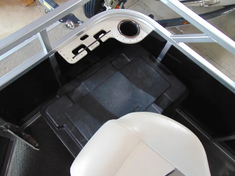 Slide: The Image of 2012 Apex Marine 1716 boat interior with seating and storage compartment. - 16