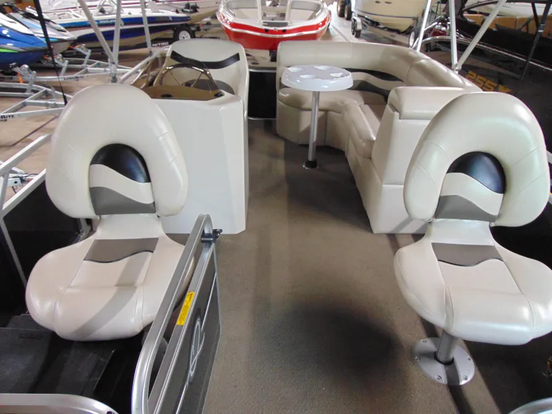 Slide: The Image of Interior of 2012 Apex Marine 1716 pontoon boat with seating and table. - 8