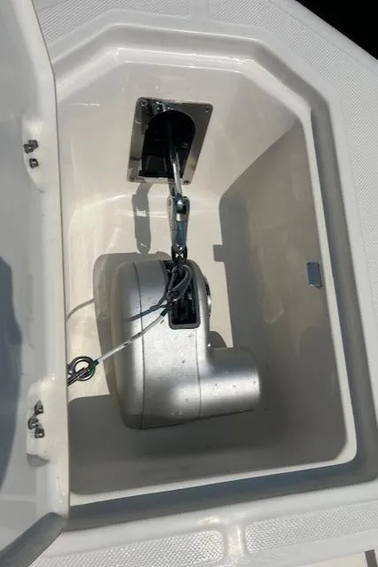 Slide: The Image of 2022 Sea Born LX26 Center Console anchor compartment with secured anchor. - 14
